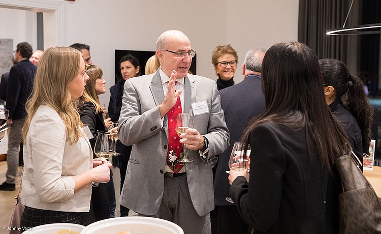 Guests socializing at the Greenwich Chamber of Commerce and Greenwich Design District Holiday Party hosted on December 5th, 2018 in bulthaup Greenwich showroom.